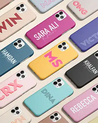 Collection of colorful personalized phone cases with different names and text designs.